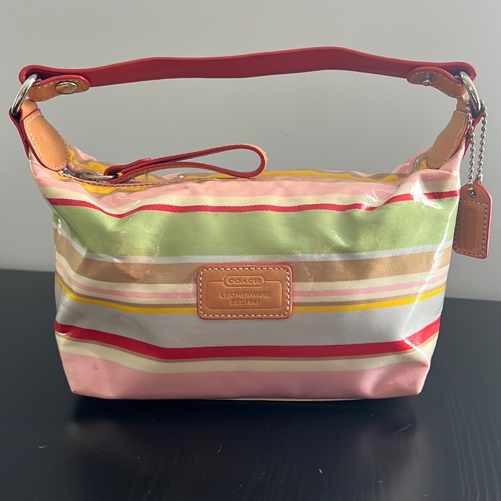 Pastel striped Coach clutch